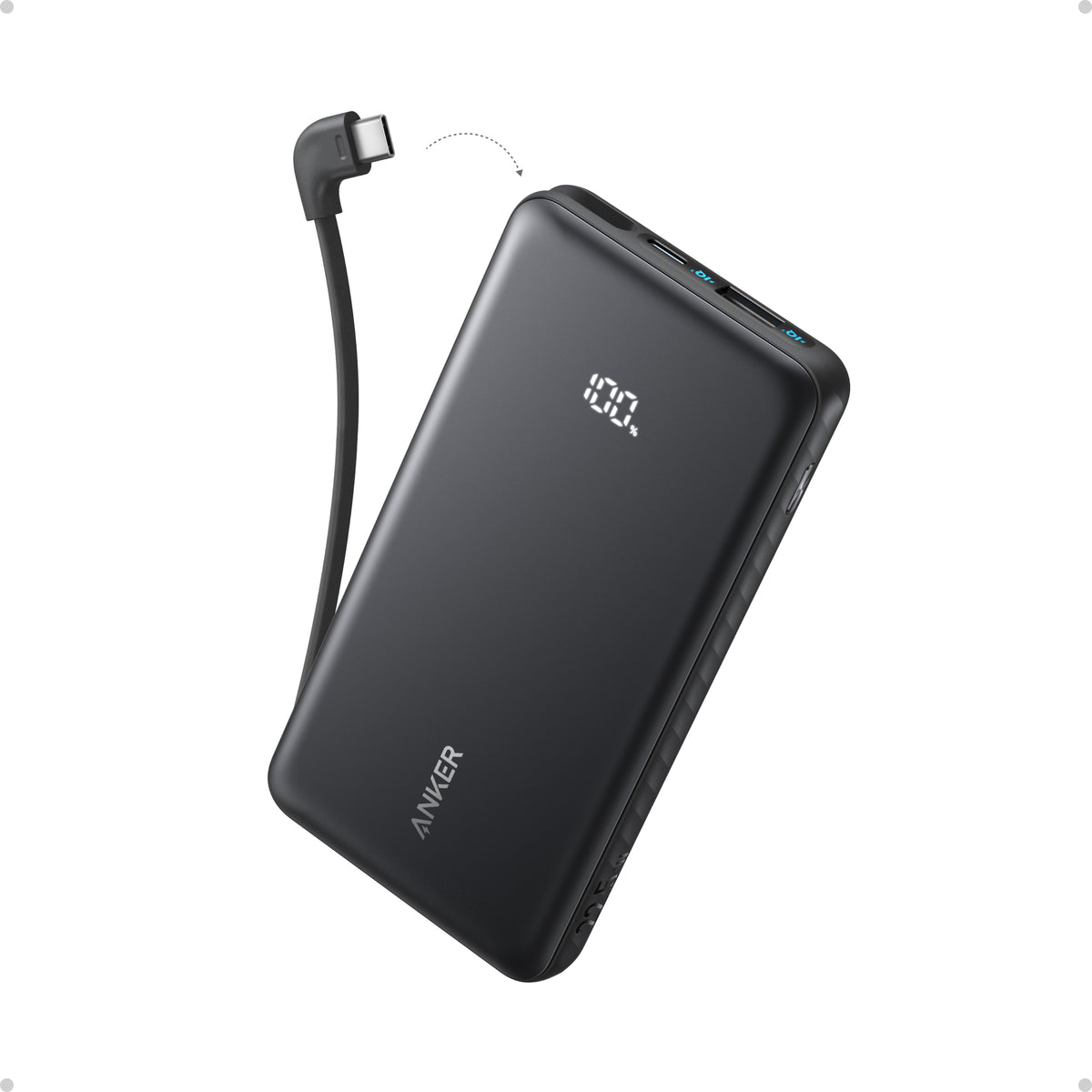 Black power bank with cable on a white background