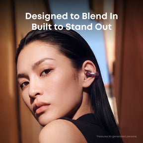 A close-up lifestyle shot of a woman with long dark hair wearing Anker Soundcore Aeroclip 2. The image features promotional text reading 'Designed to Blend In Built to Stand Out' and a small disclaimer at the bottom right.