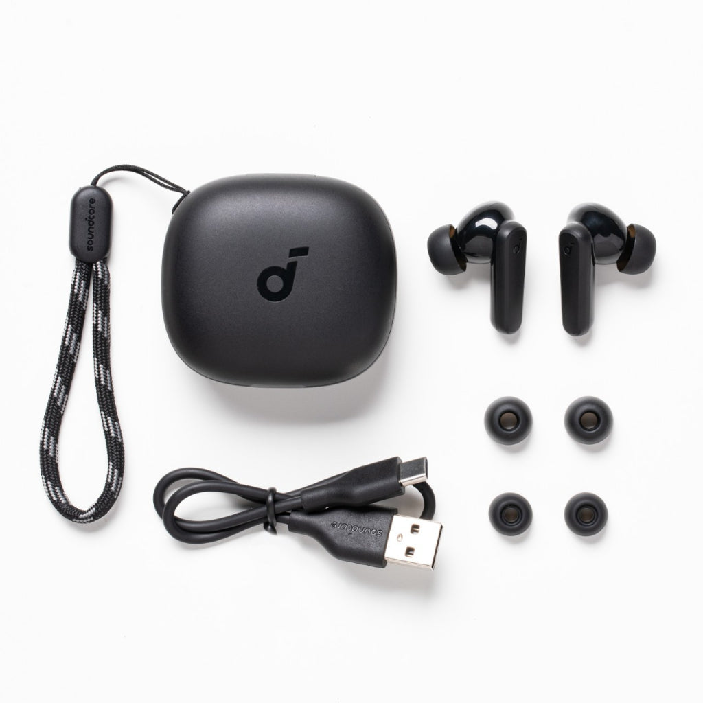 Black Soundcore R50i wireless earbuds with charging case, USB cable, and ear tips on a white background